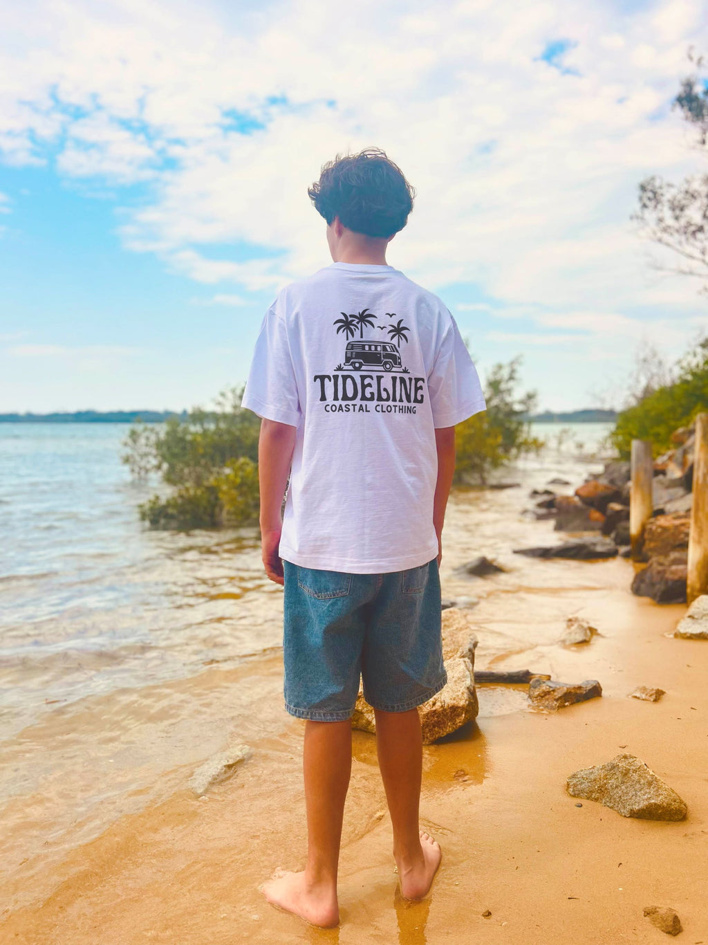 male model wearing a white coastal surf van graphic tee