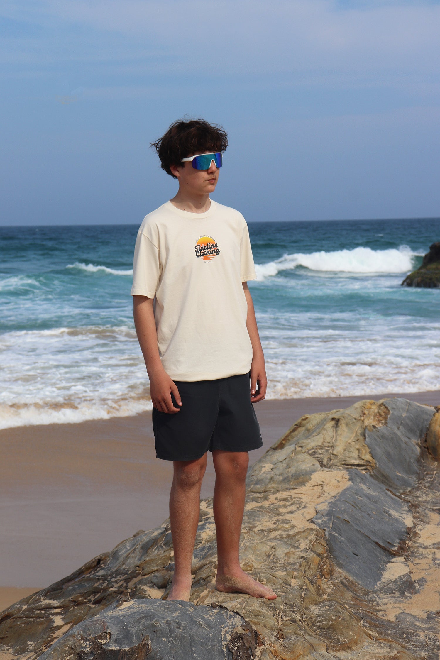 male model front view of Retro Sunset Graphic T-Shirt